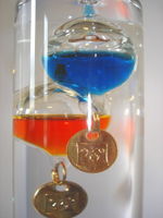Close-up of a Galilean thermometer 